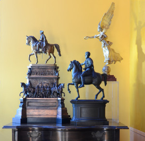 Three models with larger figures are Grand Tour souvenirs from Italy and Germany.