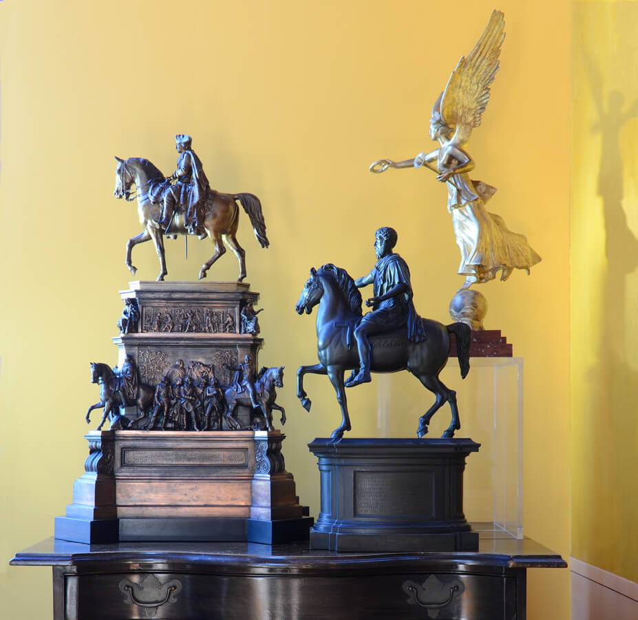 Three models with larger figures are Grand Tour souvenirs from Italy and Germany.